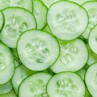 cucumber-slice-royalty-free-image-153556336-1562870568.jpg
